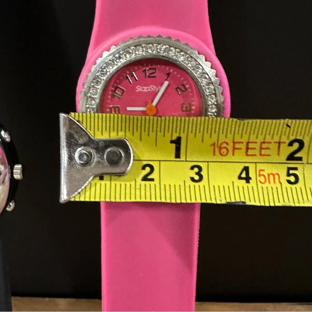 Pink and black snap wrist watches, set of two